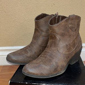 Washed out brown boots